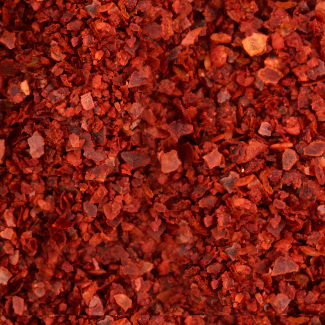 Also known as pul biber, Aleppo chilli flakes are named after the city of Aleppo and can be used in place of any chilli to add an authentic Mediterranean kick.
The Aleppo chillies are dried and flaked, providing a moderate heat and distinct fruity flavour.
The robust flavour of these chilli flakes makes them perfect for adding to soups, pasta dishes and curries.