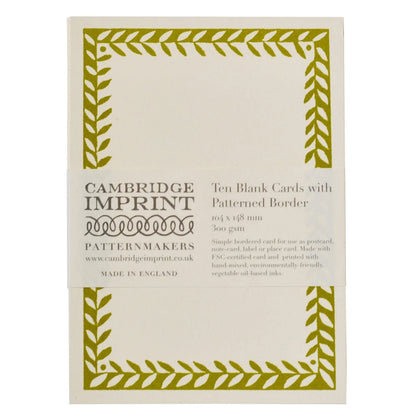 Pack of Cambridge Imprint blank cards with Bawden green border design on a white background