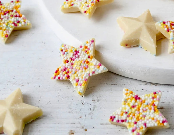 Snowie Stars - Christmas white chocolate stars scattered with rainbow sugar ball hundreds and thousands.